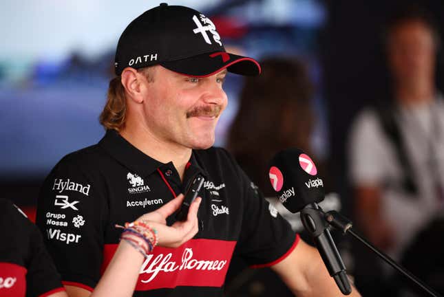 Valtteri Bottas of Finland and Alfa Romeo F1 talks to the media in the Paddock during previews ahead of the F1 Grand Prix of Mexico at Autodromo Hermanos Rodriguez on October 26, 2023 in Mexico City, Mexico