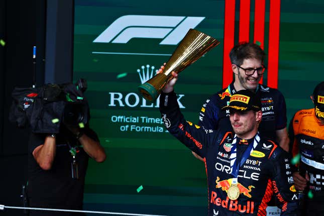 Race winner Max Verstappen of the Netherlands and Oracle Red Bull Racing celebrates on the podium during the F1 Grand Prix of Brazil at Autodromo Jose Carlos Pace on November 05, 2023 in Sao Paulo, Brazil