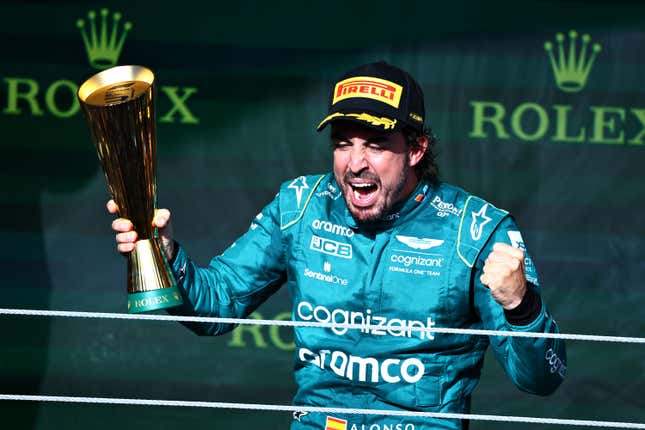 Third placed Fernando Alonso of Spain and Aston Martin F1 Team celebrates on the podium during the F1 Grand Prix of Brazil at Autodromo Jose Carlos Pace on November 05, 2023 in Sao Paulo, Brazil